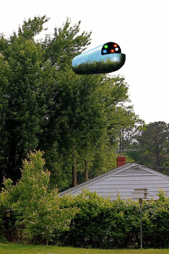 Adult male witnesses very bizarre-looking "tube-shaped" object in the vicinity of his home.