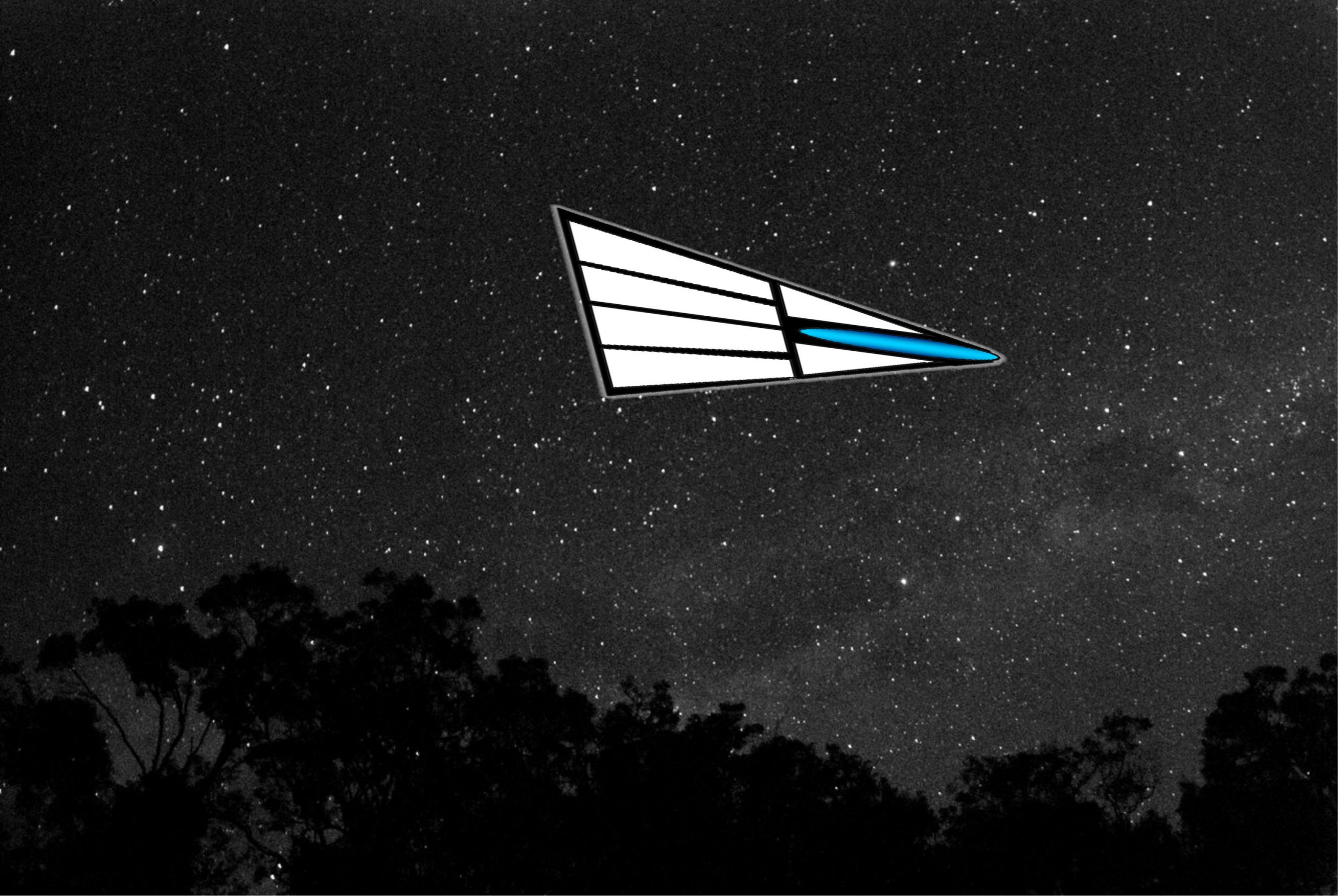 Triangular UFO with white and blue lights.