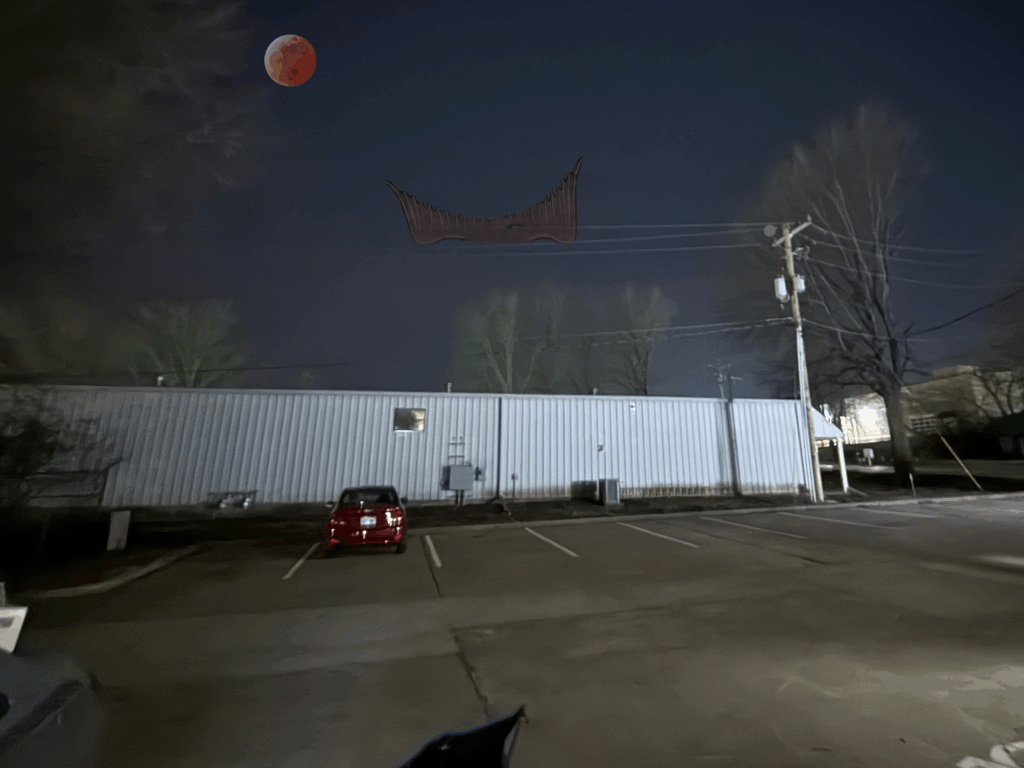 flying wing boomerang ufo during lunar eclipse