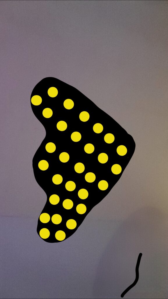 Black triangle with yellow spots evenly within it