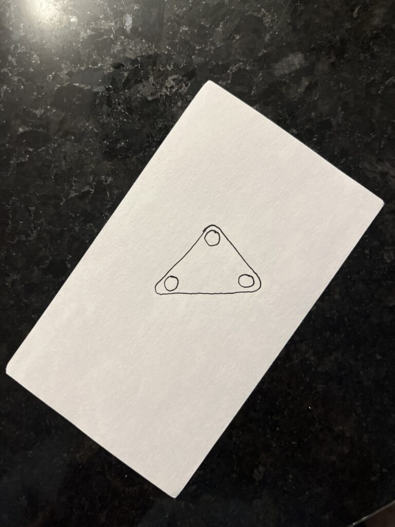 It was a floating triangle with about three bright lights