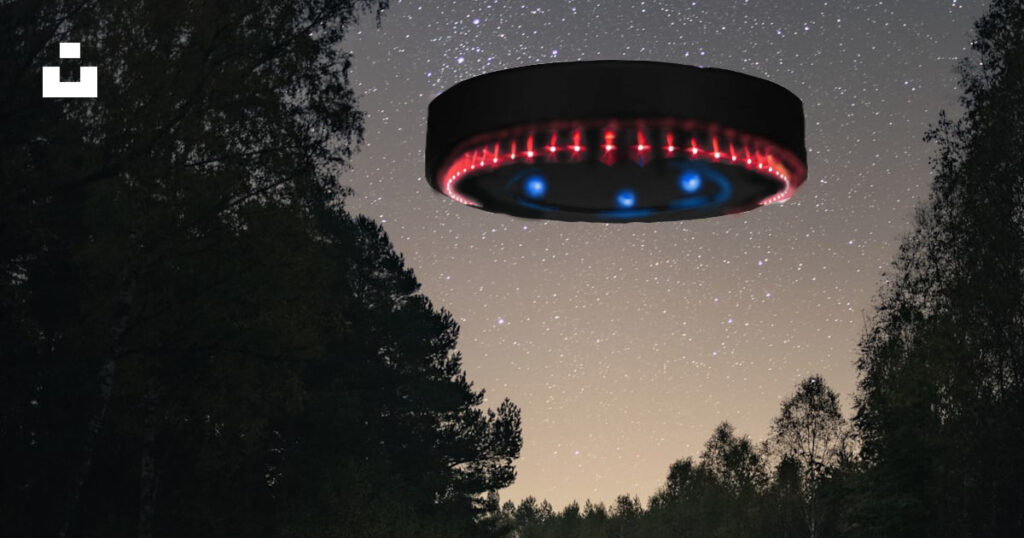 Newcastle bank birtley.. I saw a black hockey puck shaped object with a ring of red lights on the underside